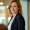 Sarah Meier, a social impact entrepreneur, depicted confidently in an innovative workspace.